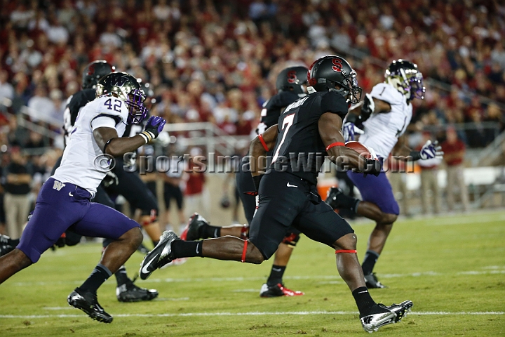 2013Stanford-Wash-052.JPG - Oct. 5, 2013; Stanford, CA, USA; Stanford Cardinal wide receiver Ty Montgomery (7) runs an end around play against the Washington Huskies at  Stanford Stadium. Stanford defeated Washington 31-28.